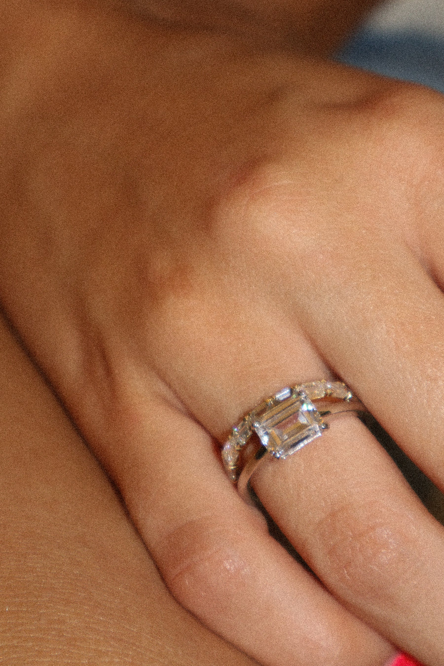 East West Emerald Cut Solitaire