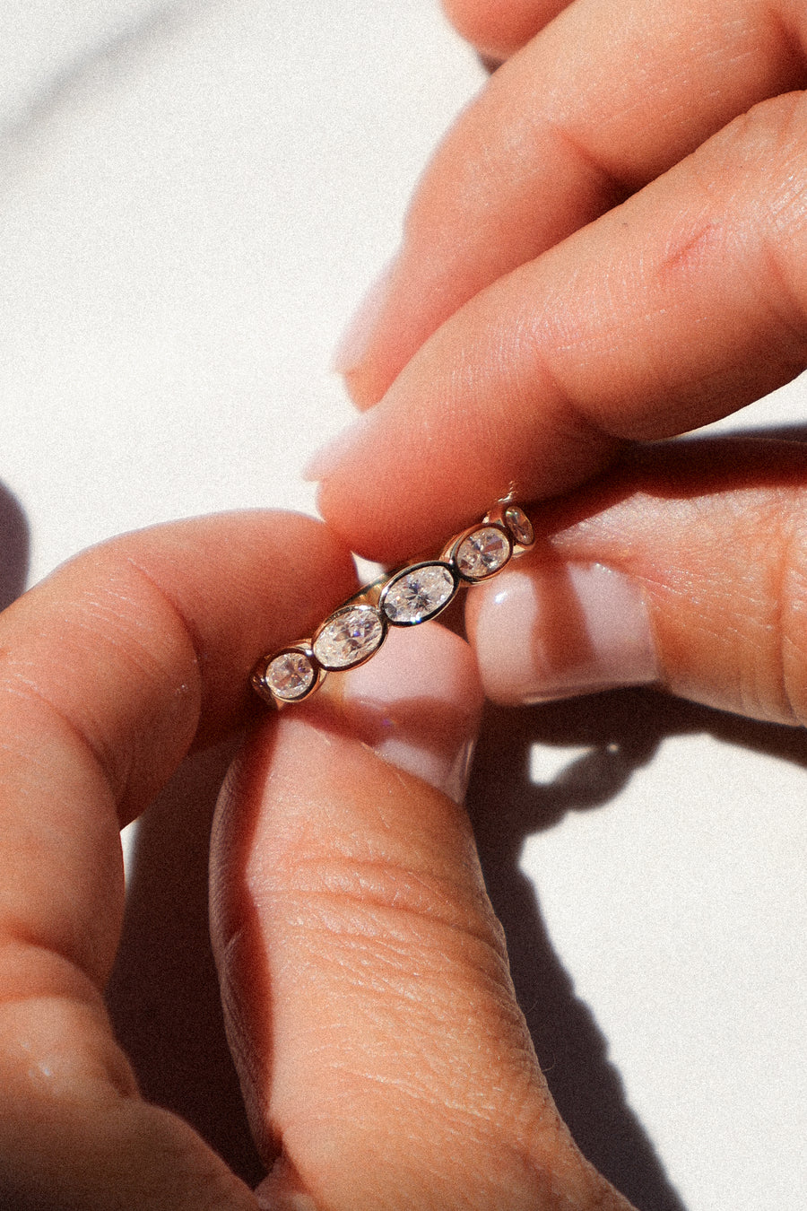 Half-Eternity Oval Bezel Band